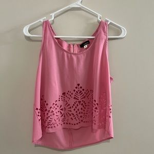 Fun cutout top for summer 22! Worn twice. Back cut out is super flattering!